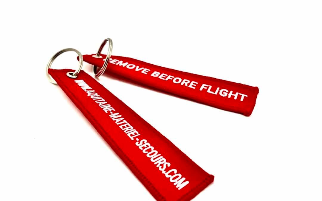 Porte clés Remove Before Flight Aquitaine Matériel Secours